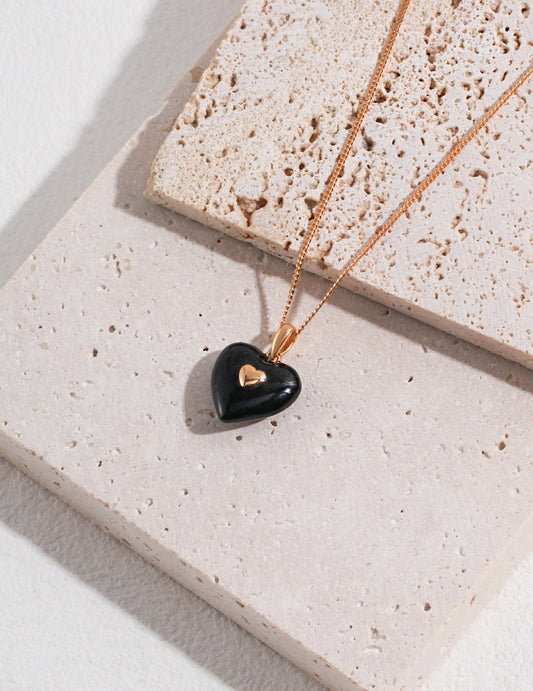 Chic Fusion: Pure Silver Heart Enamel Necklace with Black and Gold Accents