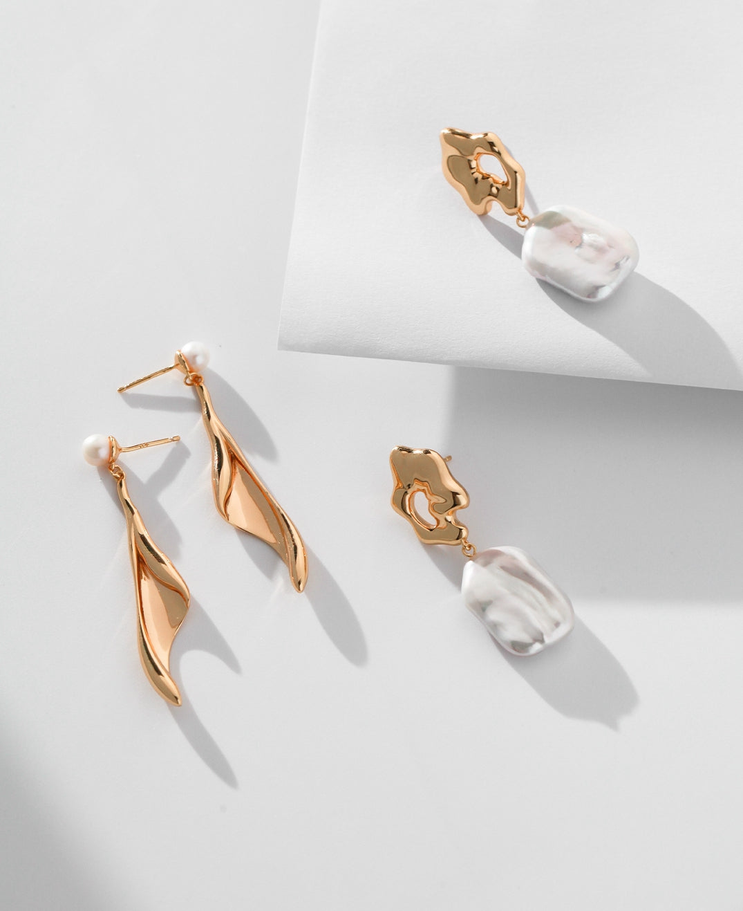Elegant Sterling Silver Baroque Pearl Earrings: A Fusion of Artistry and Rarity
