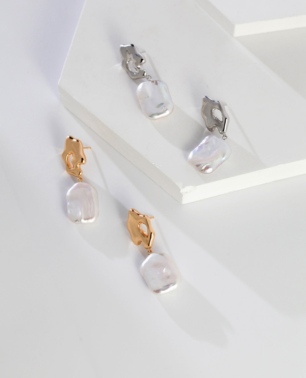 Elegant Sterling Silver Baroque Pearl Earrings: A Fusion of Artistry and Rarity