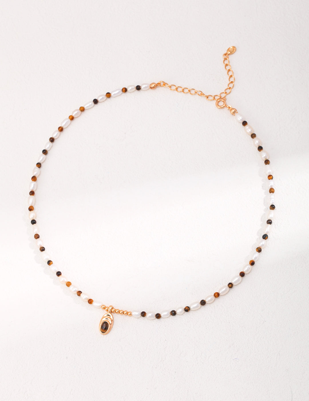 Vintage-Inspired Pearl and Tiger's Eye Necklace with Ethnic Flair